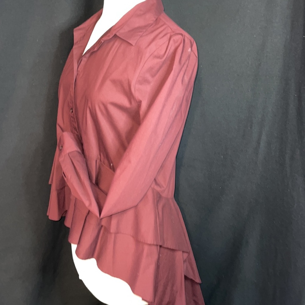 Dark maroon button up long sleeve collar blouse with layers around it